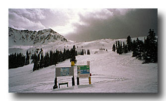 End of lower chair lift, transition to upper basin on the left