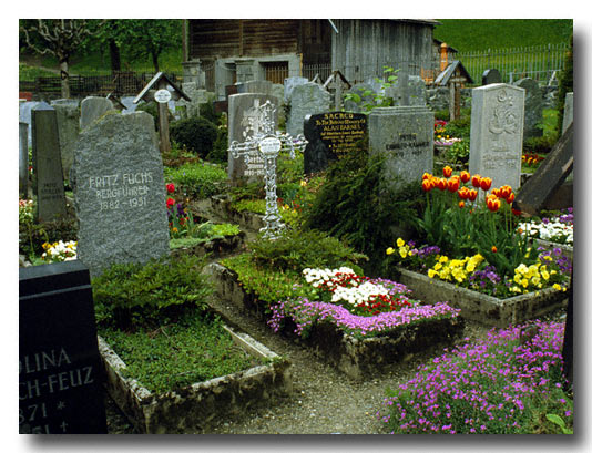 Decorated with flowers, cemetery in Lauterbrunen, Switzerland - Scan from a slide