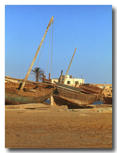 Fishing boats on an abandoned villatge on the Red Sea.  April 1972- Scan from a slide.